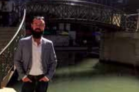 Bearded man in symphony hall